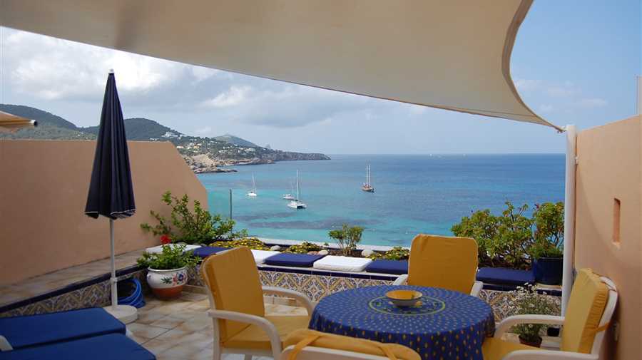 Great apartment in Cala Tarida first sea line with fantastic views