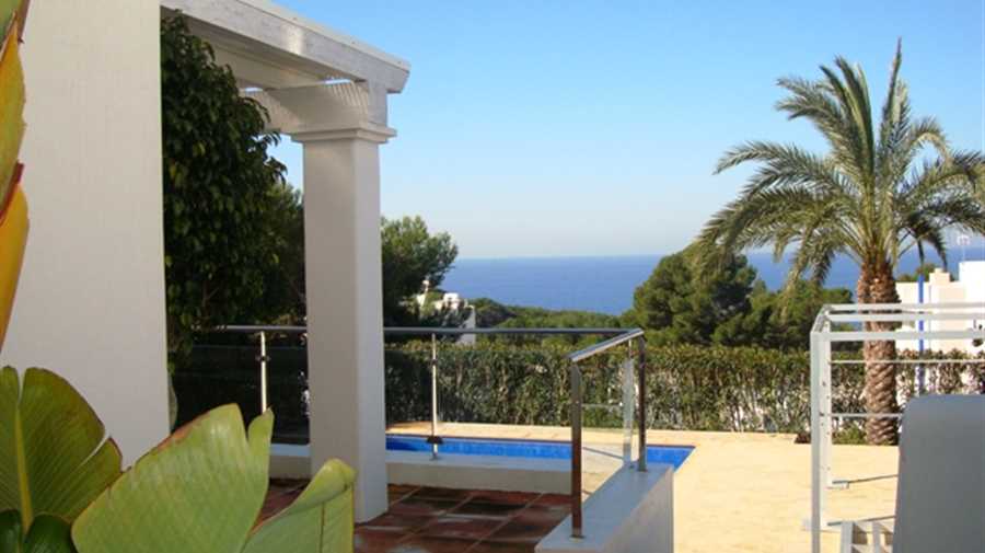 House overlooking the sea and sunset in Ibiza Cala Vadella