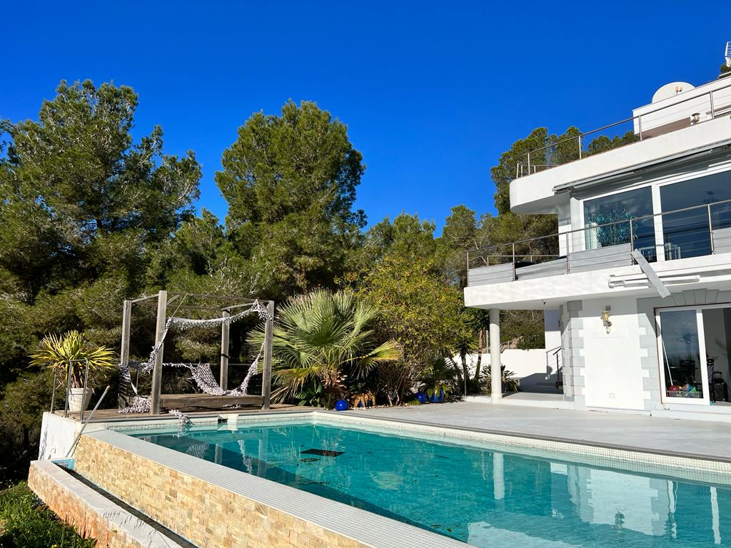 Villa on a hillside with views up to the Salinas pools & the sea
