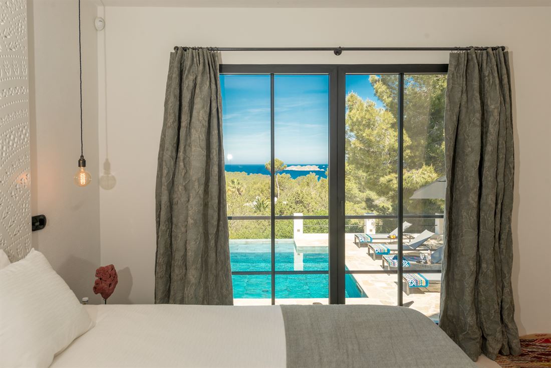 Five-bedroom villa in Cala Tarida with rental license and sea sunset views