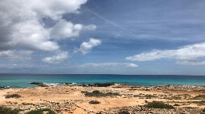 Tranquil Beachfront Villa with Stunning Sea Views in Es Caló, Formentera